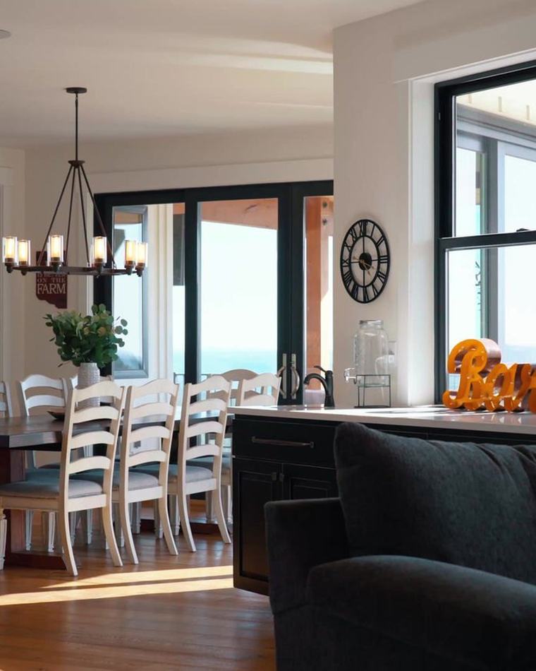 Sunlit open-plan living and dining room.